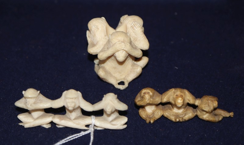 Three Japanese ivory okimono of the monkeys Mizaru, Kikazaru and Iwazaru, early 20th century H. 2.2 - 4.5cm